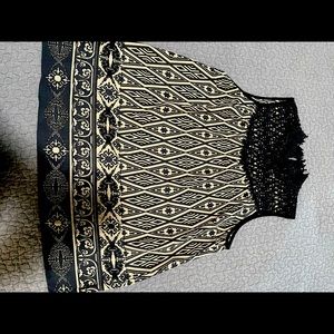 Sleeveless mock neck top